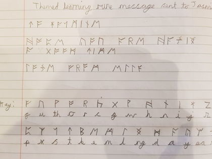 Ella in year 4 wrote a rune message to Jasmine, which she translated and then sent a reply.