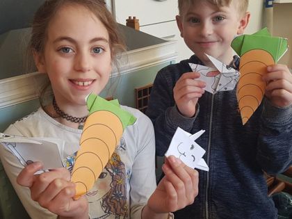 Tom and Emily have been busy gardening, doing maths and origami.