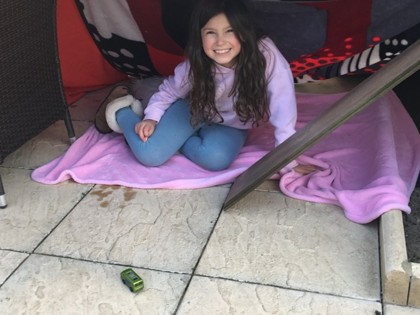 Alexia has been making a tent, being artistic and helping her brother.