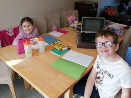 Jack from Newton class and Ellie Peake class getting on with their home learning.