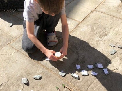 Sebastian enjoyed making his clock in the sunshine, moving the hands to read different times of day and then doing the time challenge cards.
