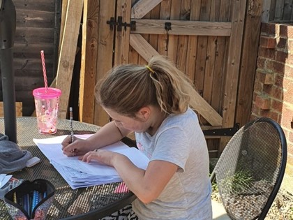 Sienna from Darwin class had a great first week back after Easter. She enjoyed drawing a sloth, writing her Animal Town story in the garden and working hard on her maths.