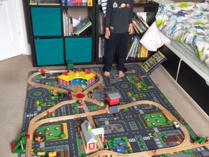 Extra maths challenge! Isabel and Sebastian built a train track and then had to work out how long the track was. We discussed how to go about it without breaking up the track and how they might measure the curved pieces! They calculated it was 6m 59cm.