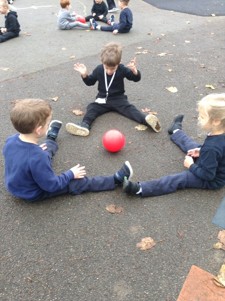 We've enjoyed practising ball skills in PE. We were passing the ball to our friends by rolling it or trying to pass it over and under. We also enjoyed balancing on some of the different sports equipment.