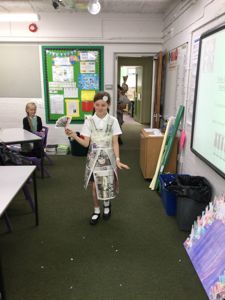 Newspaper Fashion Show As part of their transition activity from Year 5 to Year 6, Pepys Class (still Austen Class at the time) had to demonstrate their teamwork skills and design prowess as they walked the catwalk in their newspaper creations!